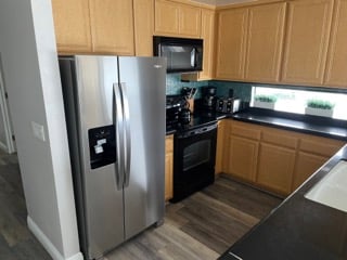 Fully equipped kitchen for meals at home. New stainless steel refrigerator!