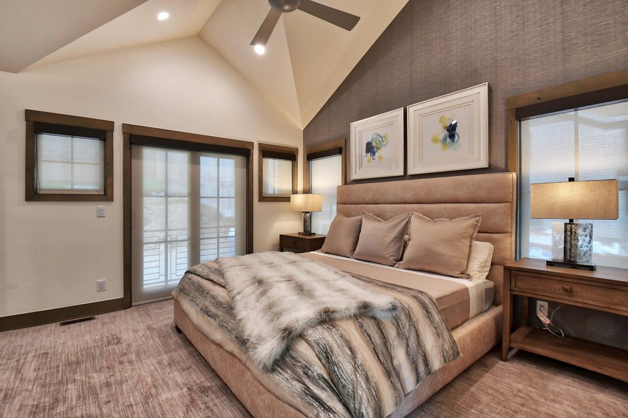 Upper Level Grand Master Bedroom with a King Bed and Private Balcony