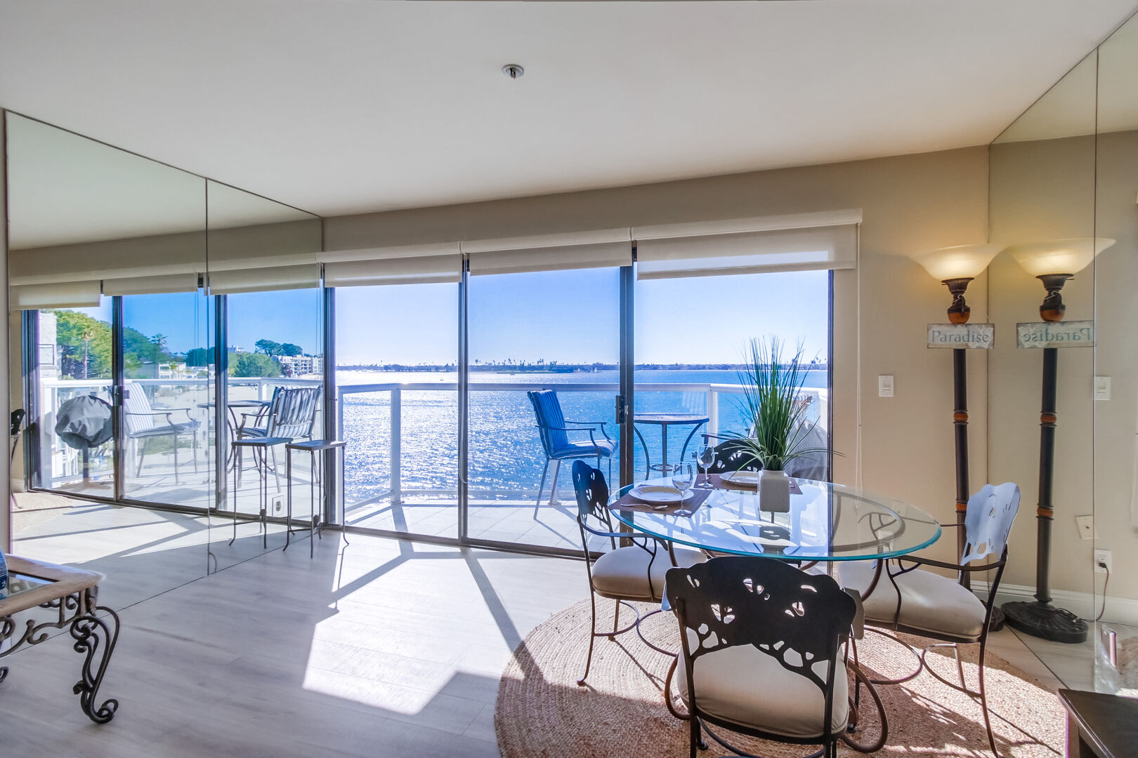 Large sliding glass doors open to a private balcony with breathtaking view