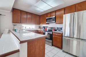 Stainless steel appliances and plenty of cooking space for meals at home!