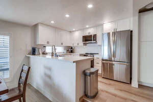 BRAND NEW KITCHEN! All new flooring, recessed lighting, appliances and cabinetry!