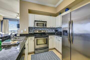 Kitchen area with stainless steel appliances