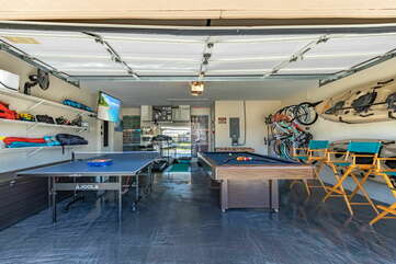 AIRCONDITIONED GARAGE, GAME ROOM, GYM
(billiards, fussball and ping pong tables, kayaks, bikes, beach and fishing gear treadmill, weight bench, and weights)