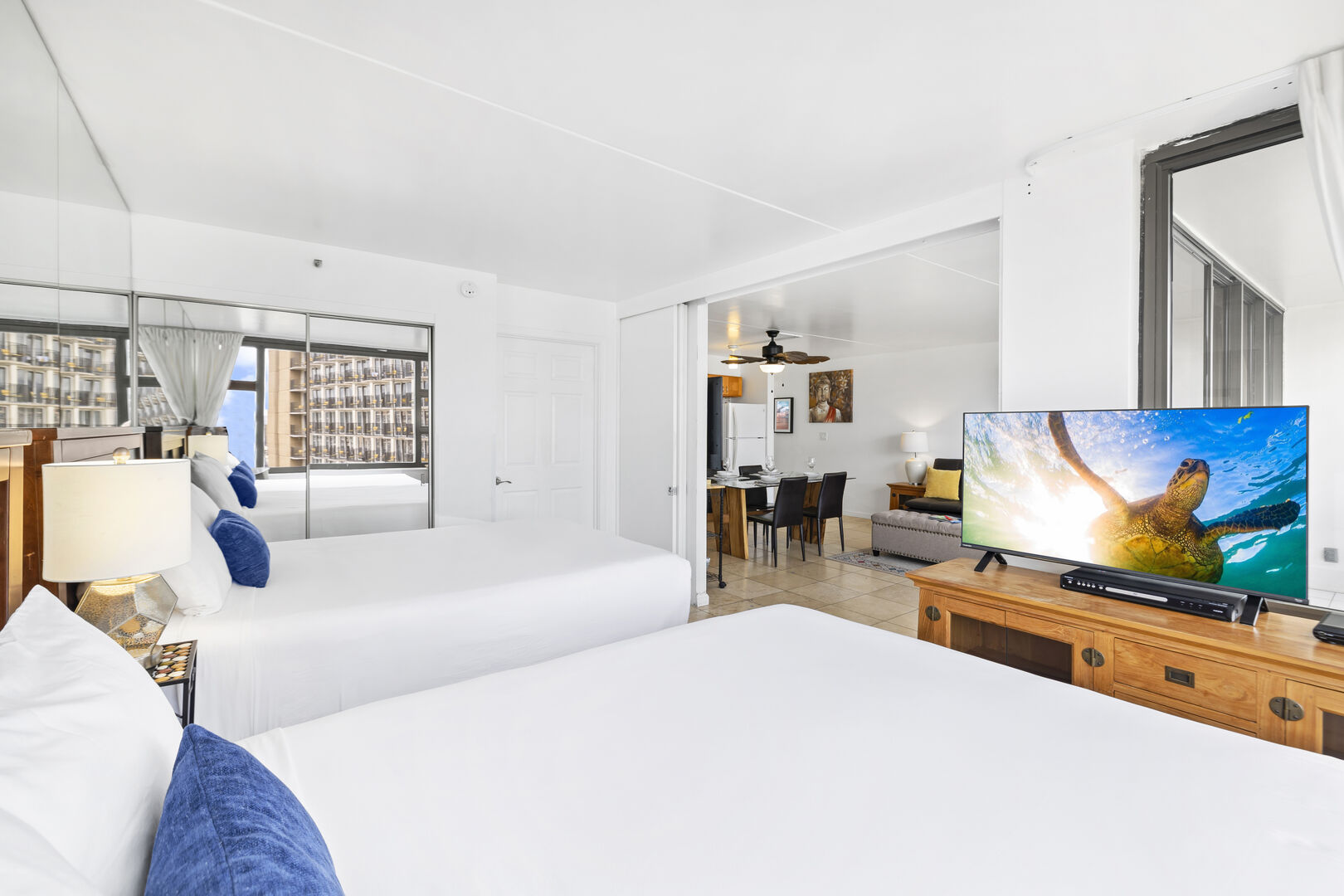The bedroom features 2 Queen-size beds and a flat screen TV!