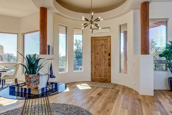 Front Entry into the Main Level with Beautiful Mesquite Solid Wood Flooring and Plenty of Natural Light