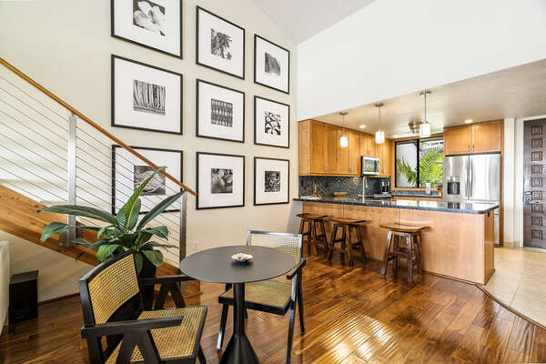 Professionally Remodeled Living Area with Wood Floors and Ample Seating