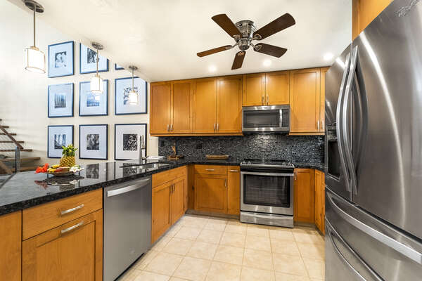 Fully Equipped and Newly Remodeled Kitchen with Black Counter Tops