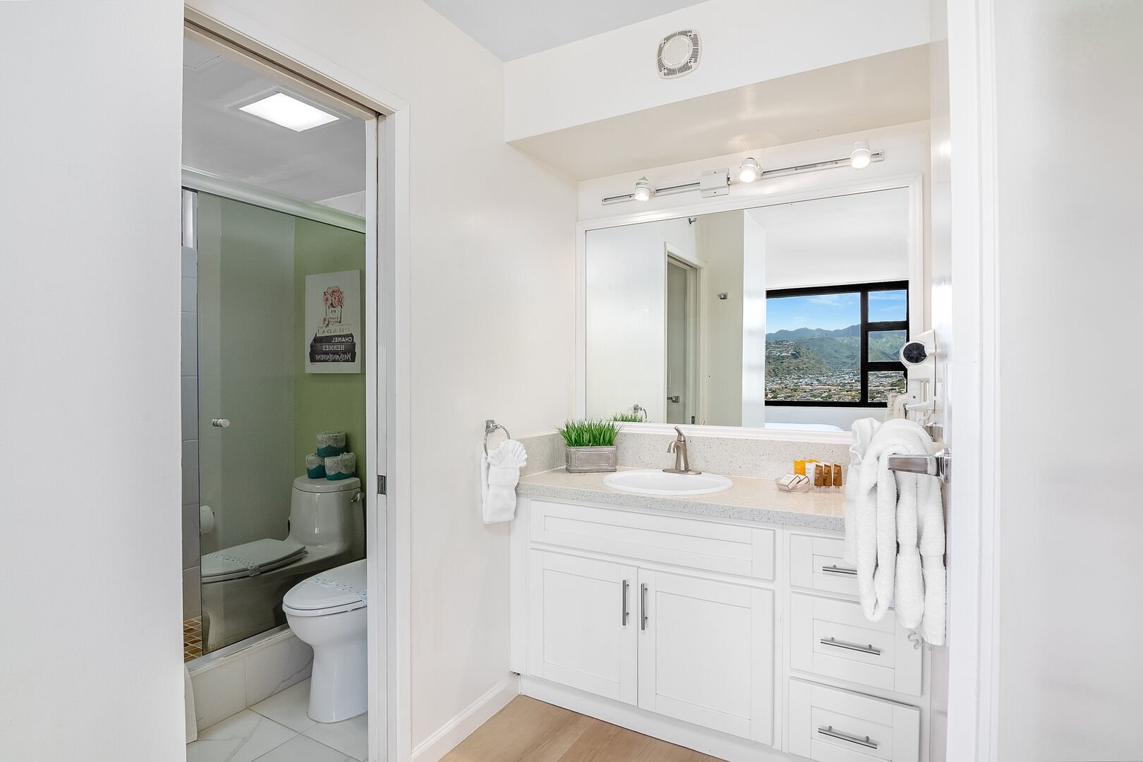 Full bathroom with walk-in shower. Full bathroom with walk-in shower.