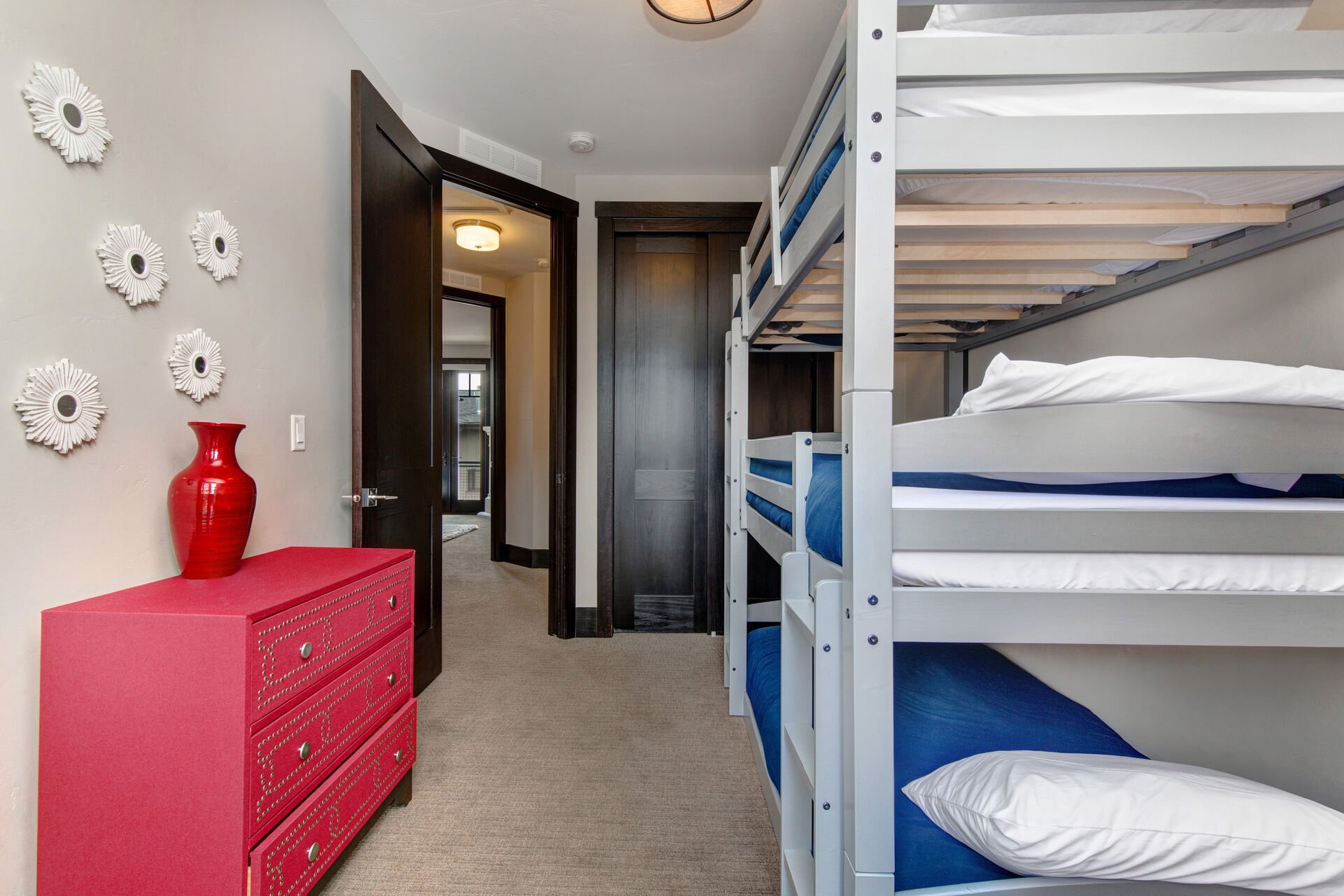 Upper Level Bedroom 3 Bunk Room with twin over twin over twin bed, private balcony, and full bath access