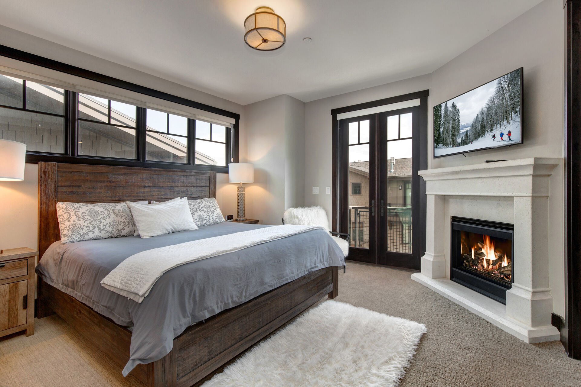 Master Bedroom with king bed, gas fireplace, 55