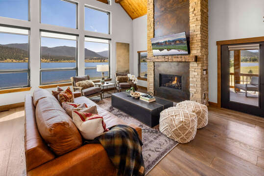 Living area with fireplace and window view