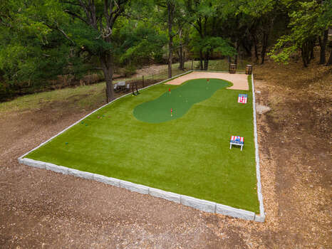 Incredible private golf hole with 40-yard and 70-yard tee boxes, plus multi-sport area with corn hole, bocce ball, and dice games
