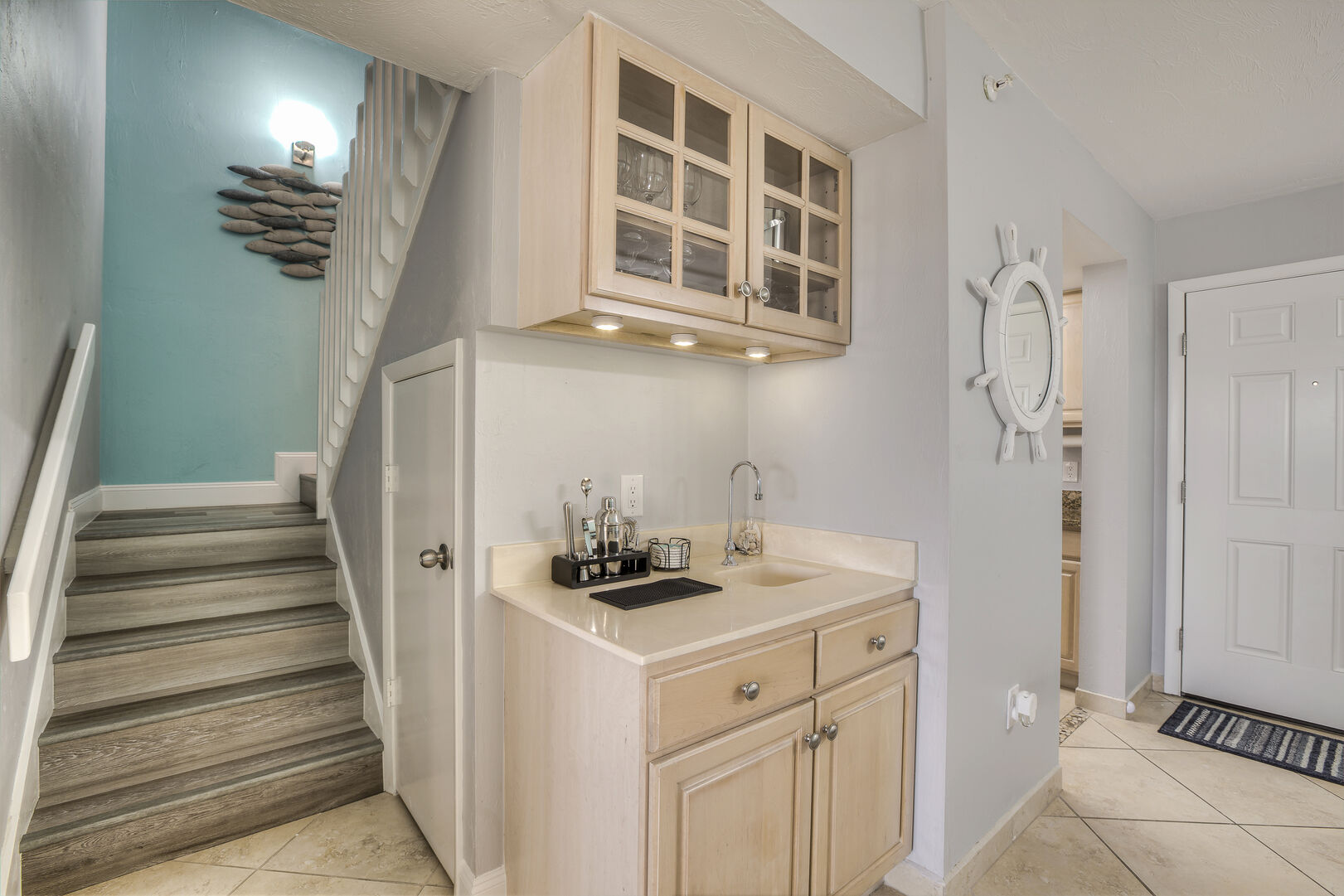 Front entryway of this Fort Myers townhouse with a wet bar.