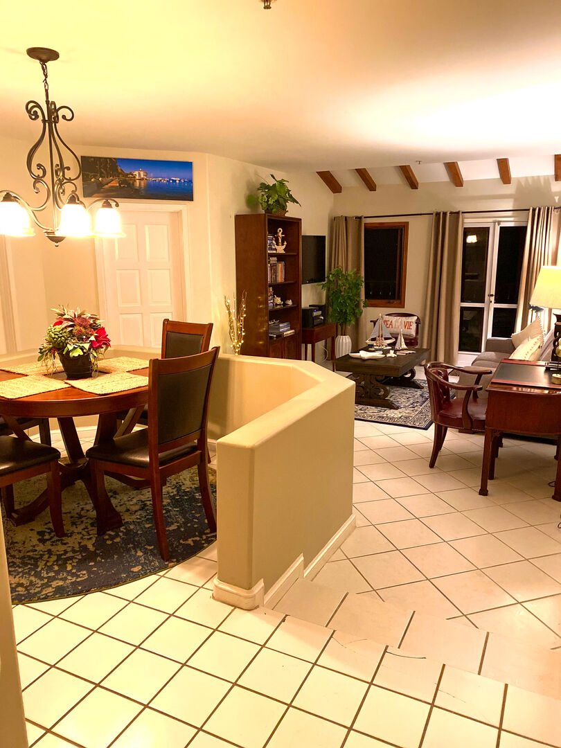 Open floor plan with dining area for 4, living room, and kitchen