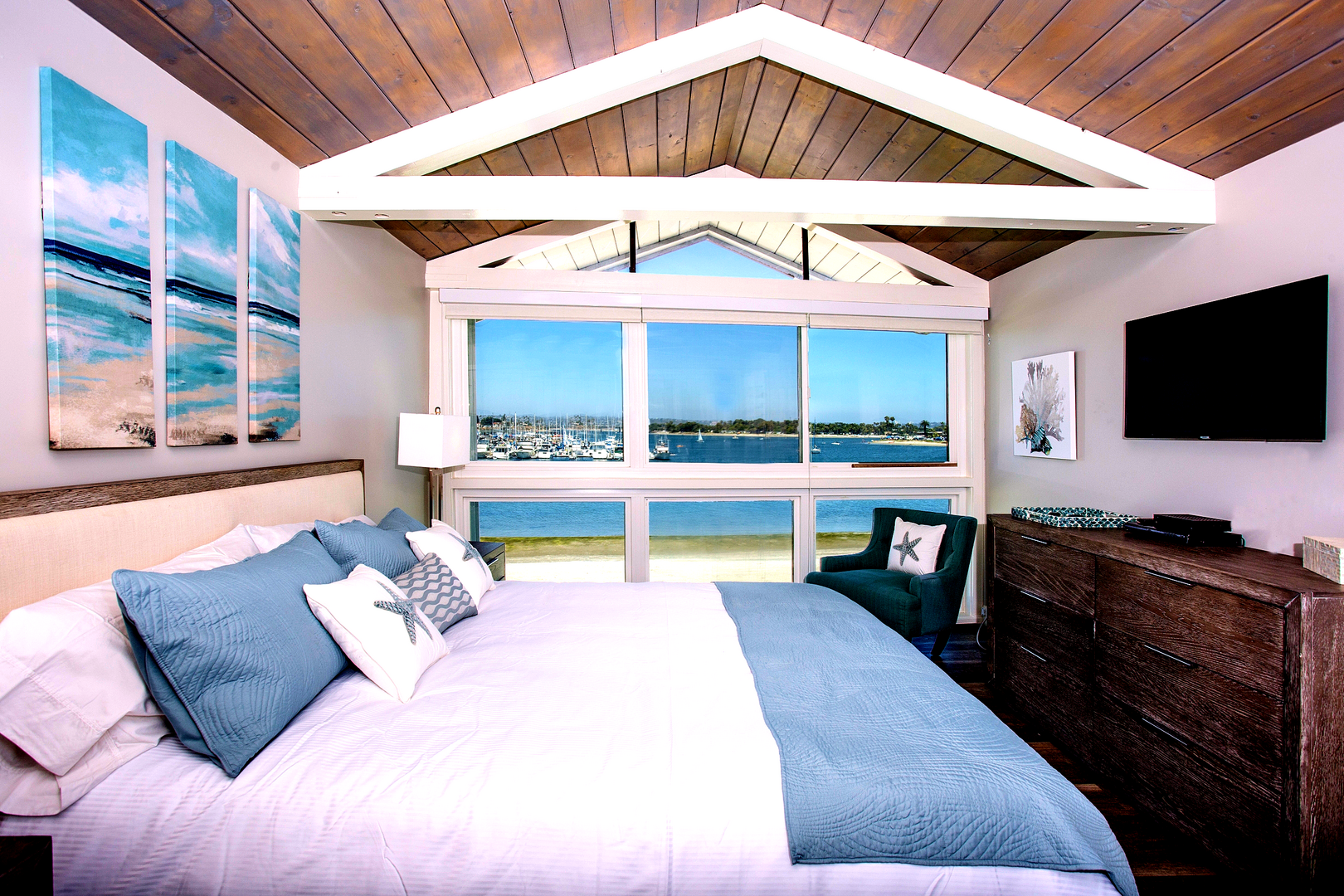 Floors were recently remodeled. Master bedroom with floor to ceiling windows to maximize your view of Mission Bay.