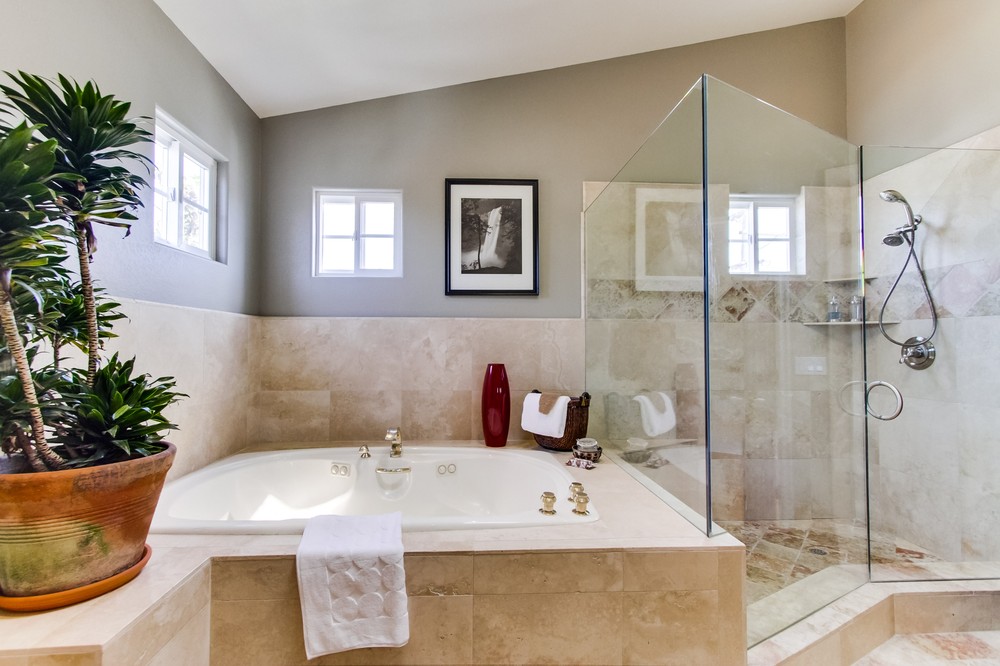 Master bathroom with large, jetted, soaking tub and separate shower