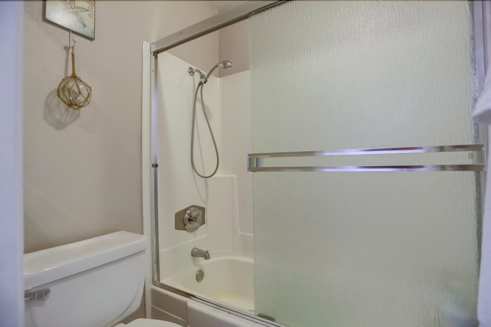 Bathroom with shower/ tub combination