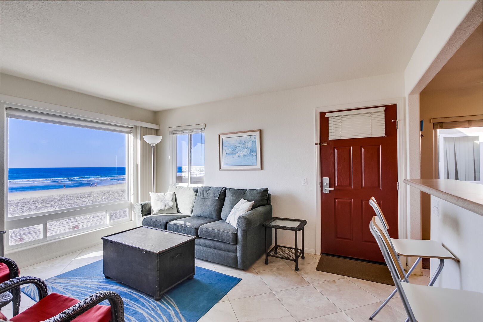 Living room with queen sofa bed and incredible views of Pacific Beach and boardwalk