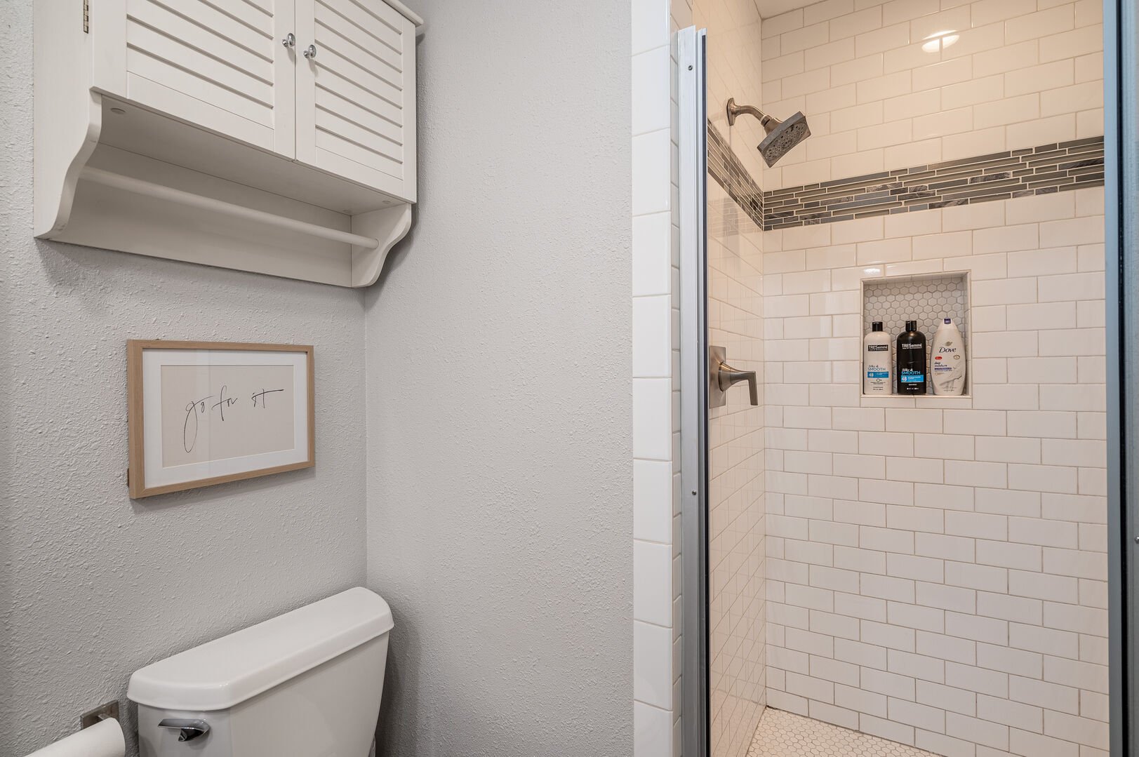 In-suite master bathroom with walk-in shower