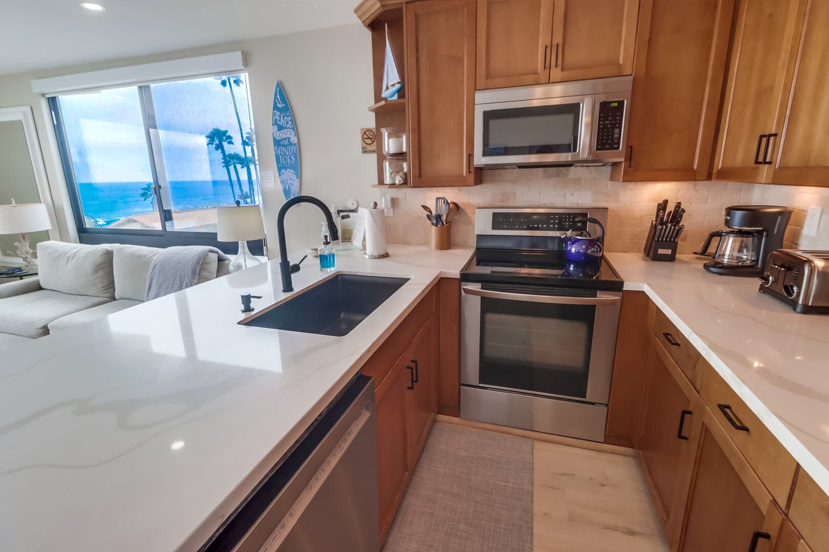 Recently remodeled with new countertops, sink, appliances and flooring!