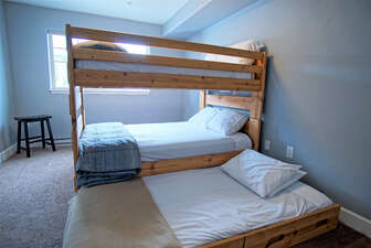 Bedroom 2 has a Double over Double bunk and a Twin bed too