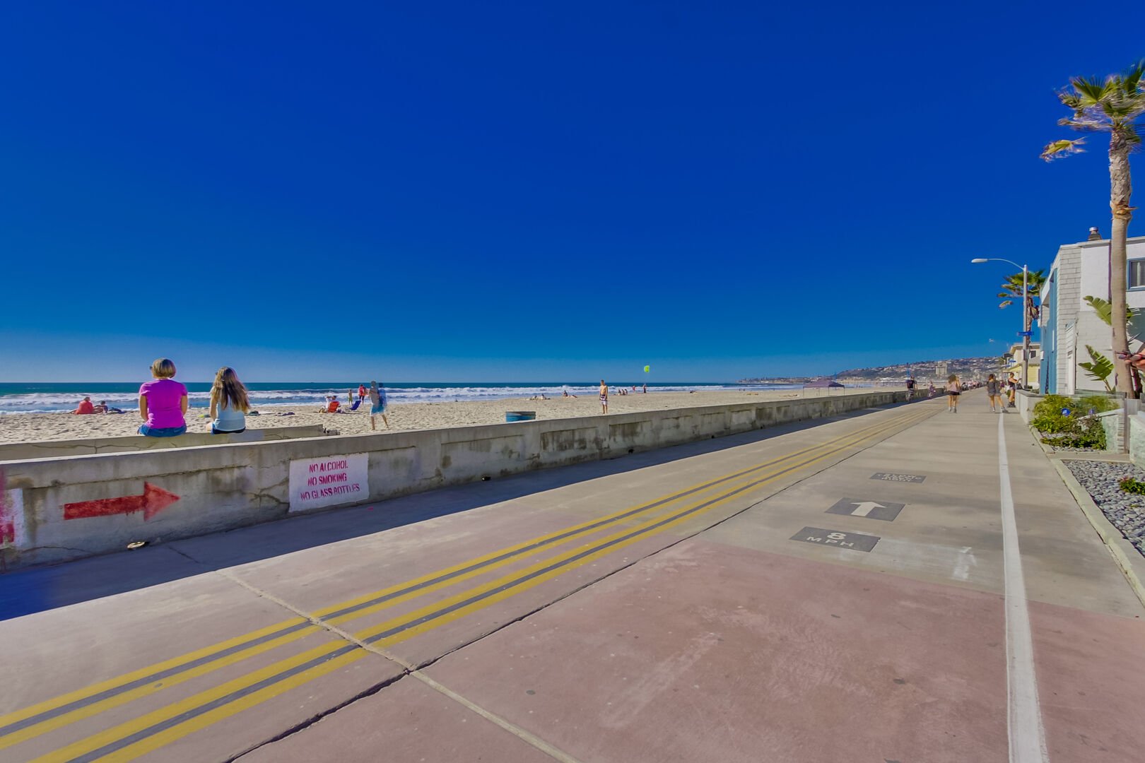 Stroll or bike along the 6 mile oceanfront loop on the Pacific Beach/ Mission Beach boardwalk
