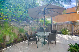 Private oasis with BBQ, dining table with umbrella and seating for 4-6 guests