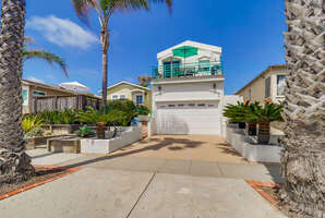 Beautiful Pacific Paradise, a multi-level home located in Ocean Beach just a short walk from the sand!