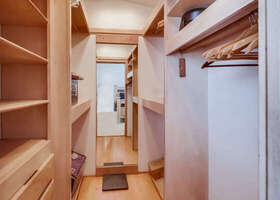 Large walk-in closet of the master suite on the second level
