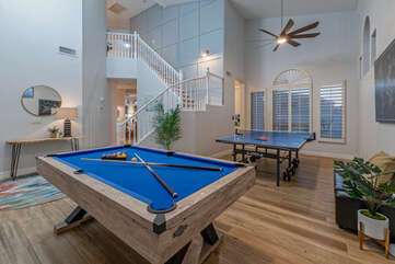 A game room with pool and ping pong tables awaits guests who enjoy friendly competition.