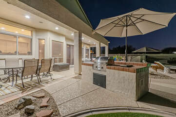 The built-in propane grill and ambiance will appeal to your outdoor chef.