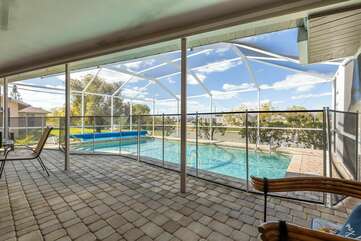 Heated pool with pool safety fence