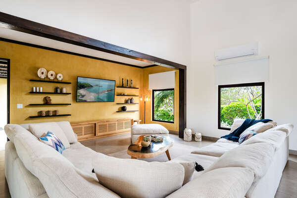 This spacious living room is a breath of fresh air.