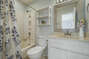 Dolphin Cove - Bathroom with shower / tub combo