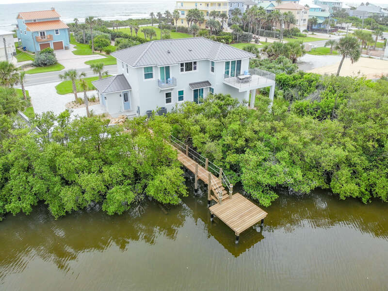Riverfront home with beach access walkway located right across the street!