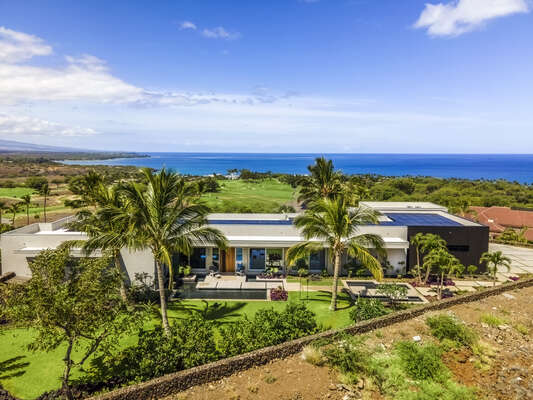 Follow the modern still ponds from the arrival court, to your luxury Mauna Kea house rental