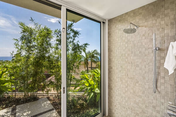 The luxury of the Solei Suite walk-in shower, just on the inside of one of two private garden outdoor showers