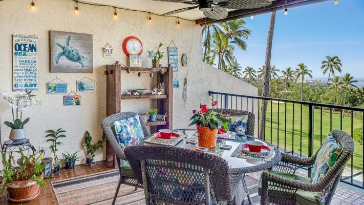 Lanai with table for seating and golf course views