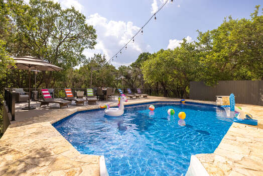Heated pool and sky deck with pool toys and basketball hoop for all ages, plus lots of lounge seating