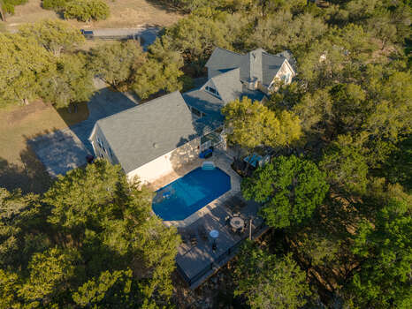 Overhead view of Hill Country Dream Ranch and heated pool with sky deck and lounge area