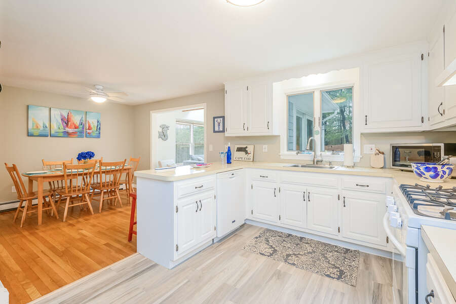 Open Kitchen, dishwasher, gas stove and microwave and dining area-46 Har-Wood Ave Harwich- Cape Cod- New England Vacation Rentals