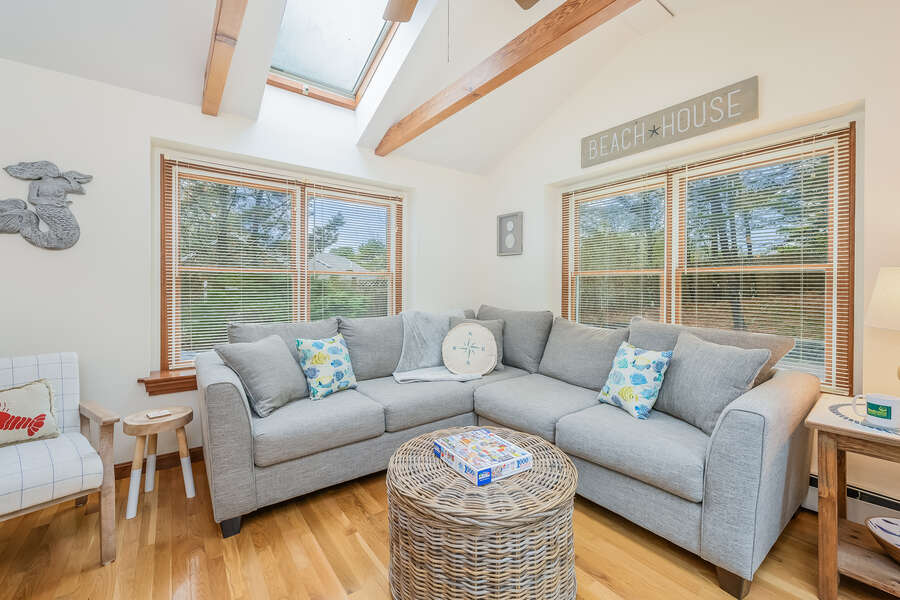Sun room with L shaped couch and lots of natural light-46 Har-Wood Ave Harwich- Cape Cod- New England Vacation Rentals