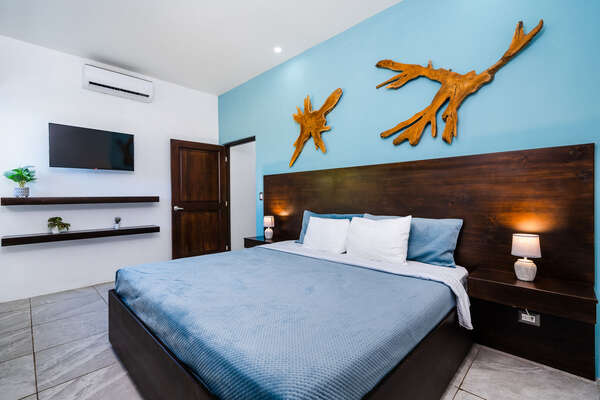 Master Bedroom 2 with One King Bed, in tropical wood, Ensuite Bathroom, TV, AC