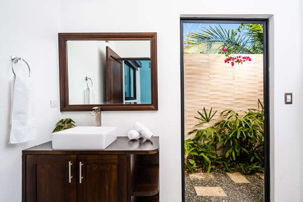Master Bedroom 1 Bright and spacious ensuite bathroom with outdoor shower