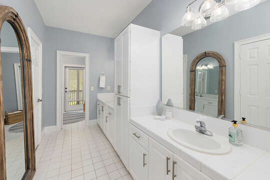 Expansive Master Bathroom leads out onto a private covered porch.