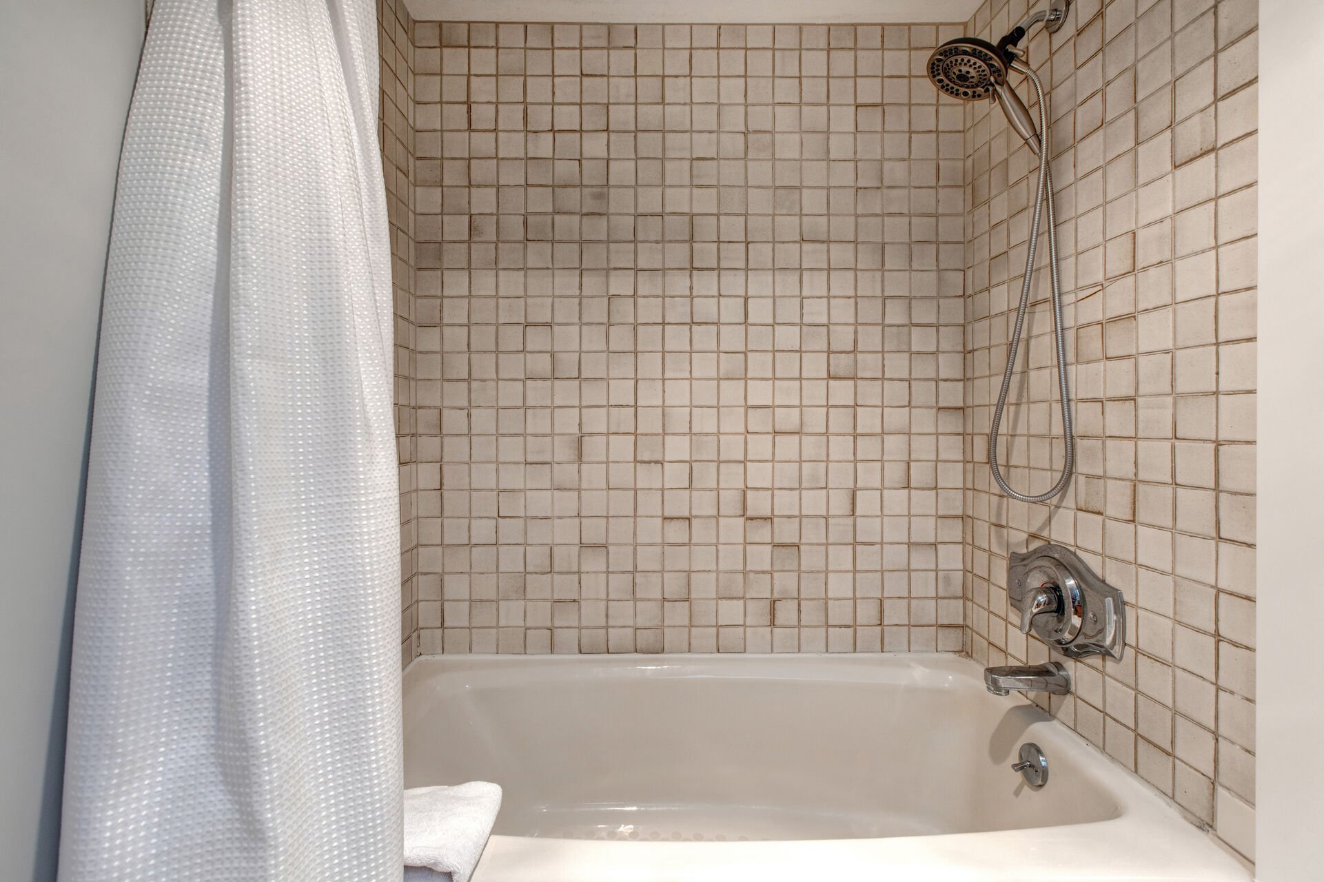 Bedroom 3 Bathroom with dual sinks and tub/shower combo