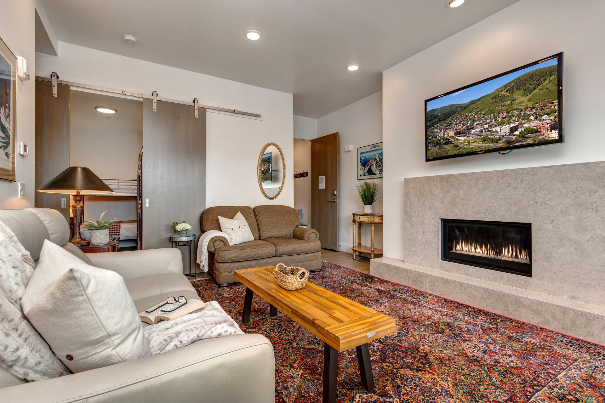 Living Room with a Comfortable Lounger Sofa, Smart TV, and Gas Fireplace