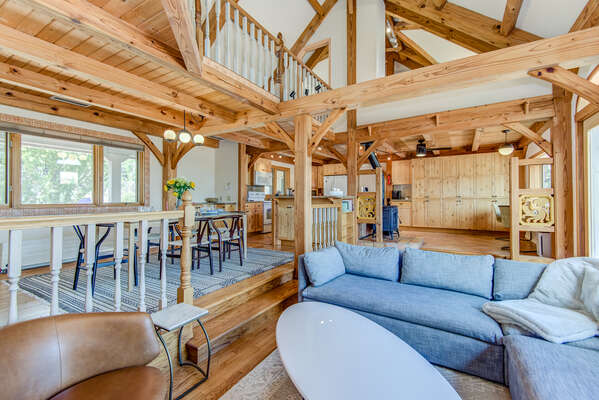 Open Floor Plan with Vaulted Wood Beam Ceilings and a Sunken Living Room