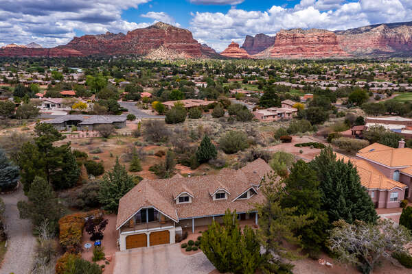 Front arial view of Sedona Village Cabin and striking surroundings