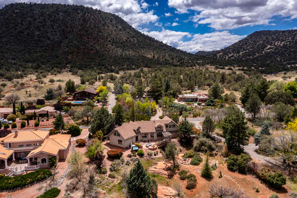 Rear arial view of Sedona Village Cabin and scenic surroundings